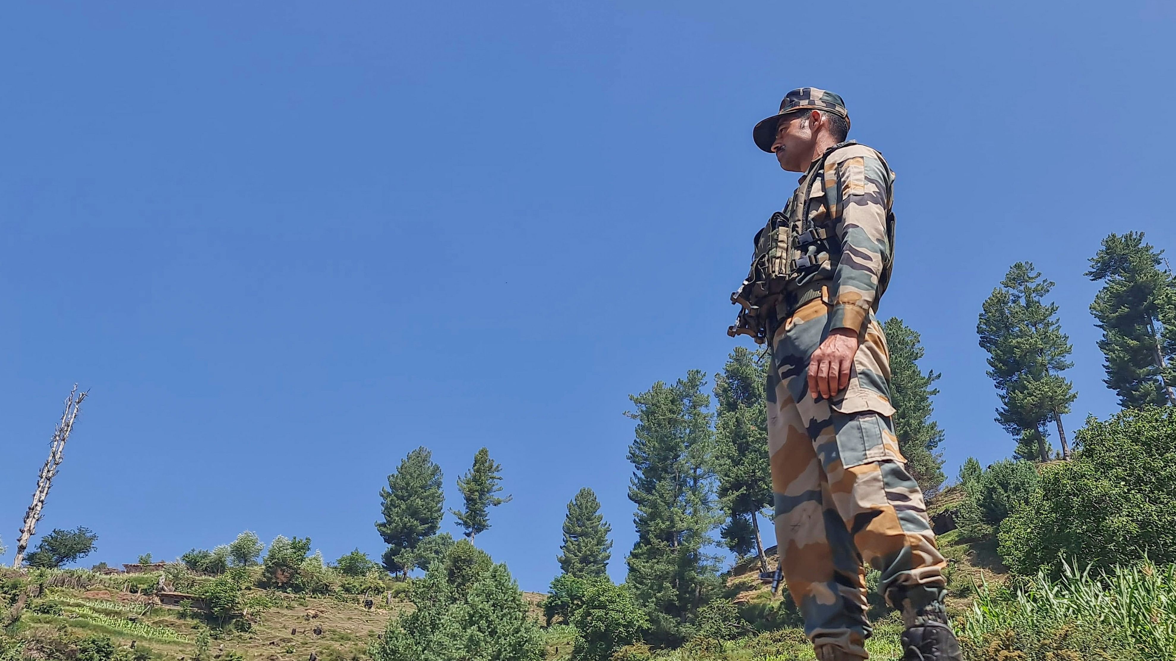 <div class="paragraphs"><p>A security personnel stands guard during an anti-terror operation.</p></div>