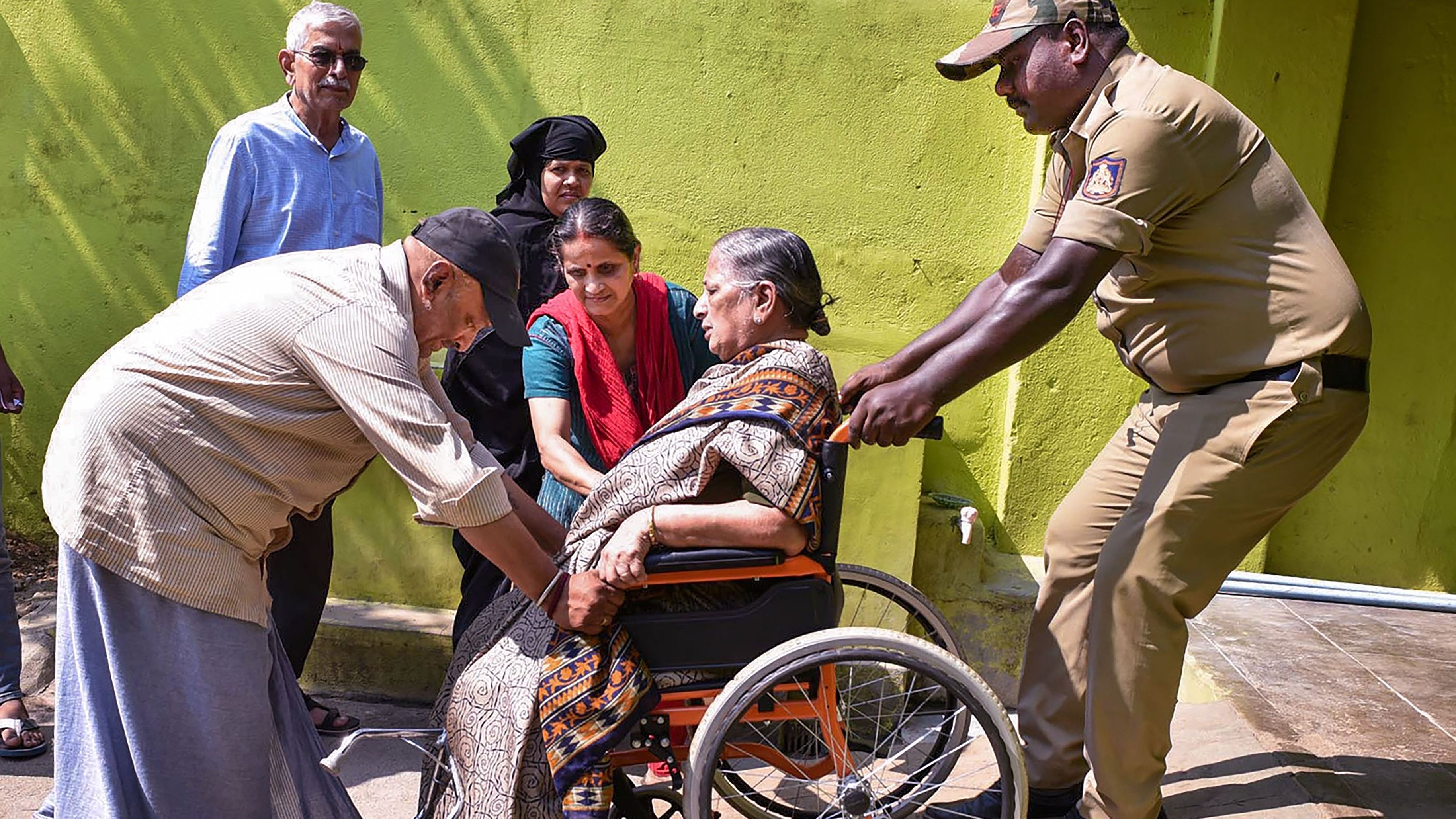 <div class="paragraphs"><p>Representative image showing a senior woman being helped.</p></div>