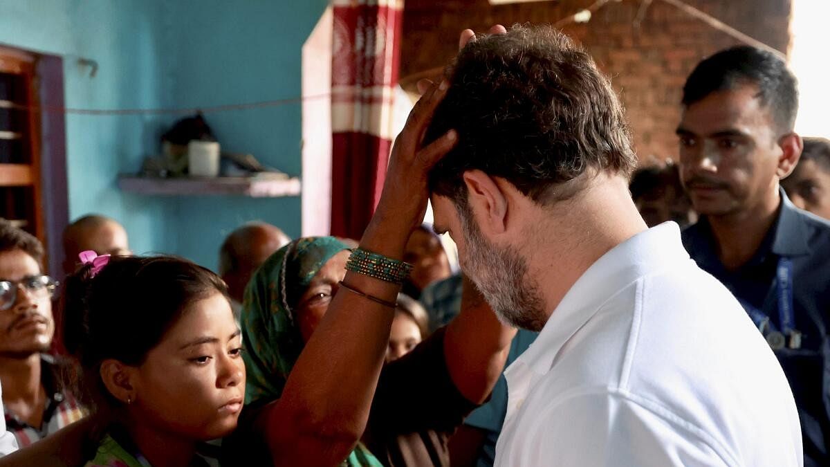 <div class="paragraphs"><p>Congress leader Rahul Gandhi meets families of the victims of Hathras stampede incident, in Pilkhana village of Aligarh.</p></div>