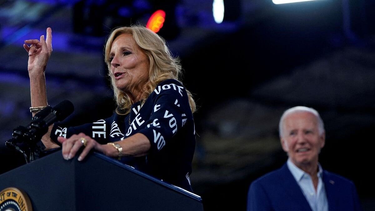 <div class="paragraphs"><p>US President Joe Biden stands onstage as first lady Jill Biden speaks during a campaign rally in Raleigh, North Carolina.</p></div>