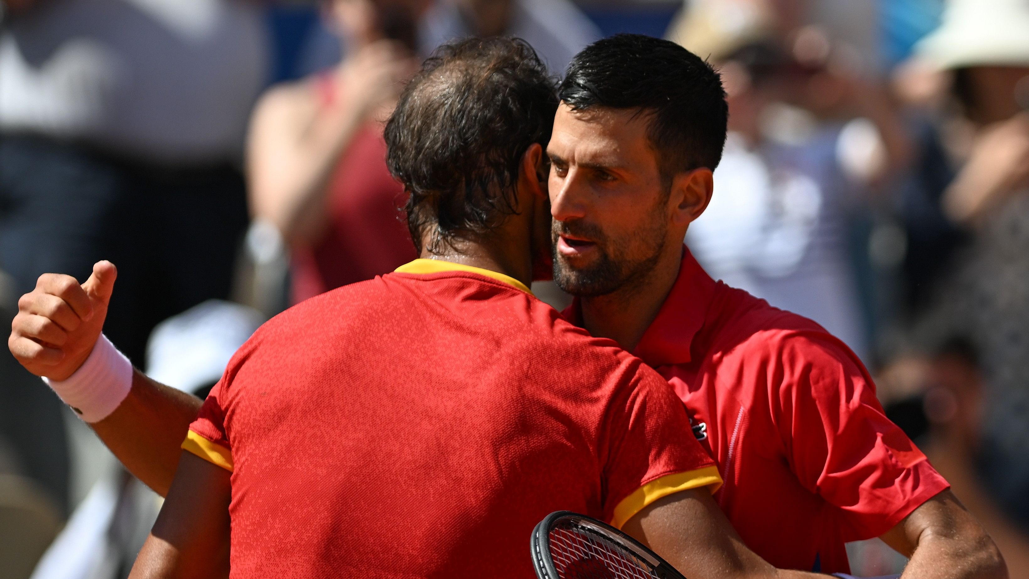 <div class="paragraphs"><p>Novak Djokovic (right) embracing Rafael Nadal after his second-round in win Paris Olympics.</p></div>