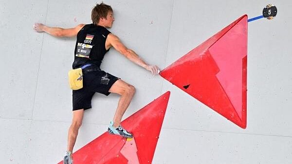 <div class="paragraphs"><p>Paris Olympics  Qualifier Series 2024 Budapest - Climbing - Germany's Alexander Megos in action during the men's boulder and lead - boulder final.</p></div>