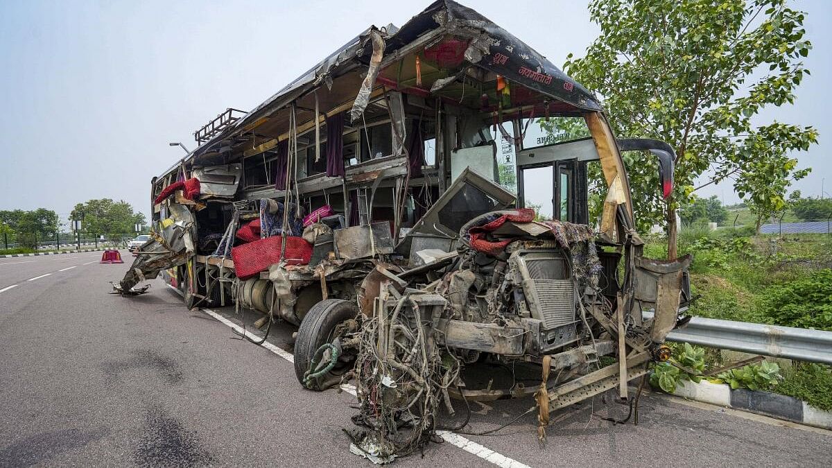 <div class="paragraphs"><p>Mangled remains of a bus lies on a road after an accident, in Unnao district, on July 10, 2024. </p></div>