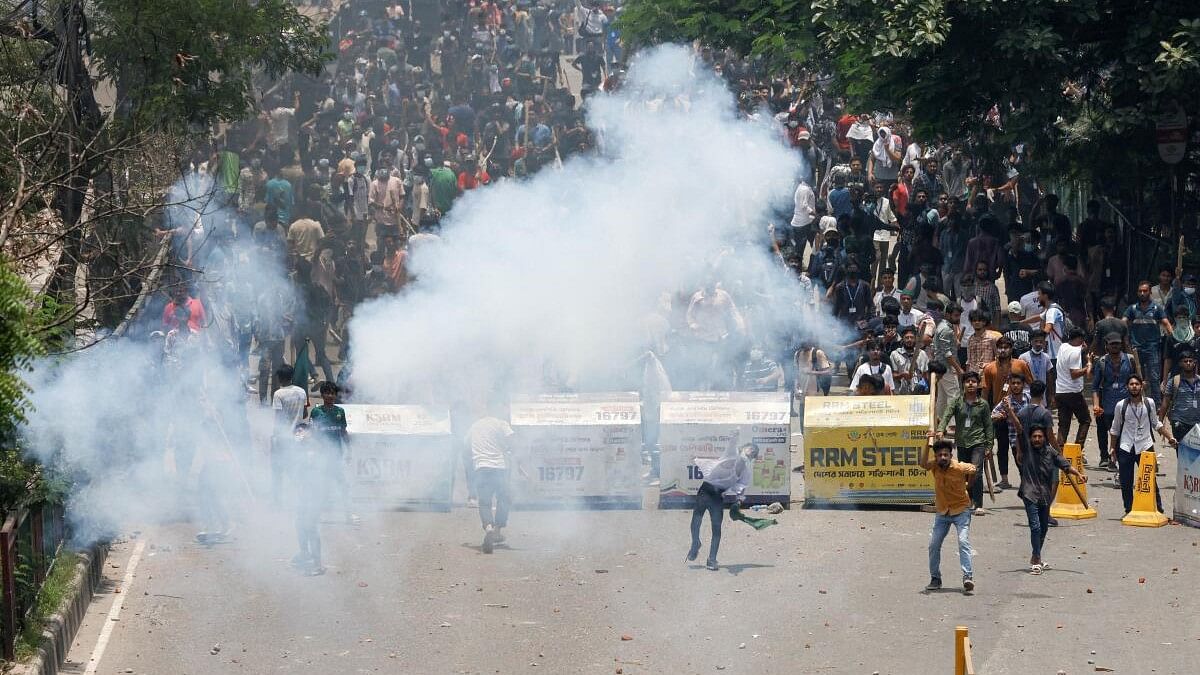 <div class="paragraphs"><p>Police fire teargas during a clash between anti-quota supporters, police and Awami League supporters at the Rampura area in Dhaka.&nbsp;</p></div>