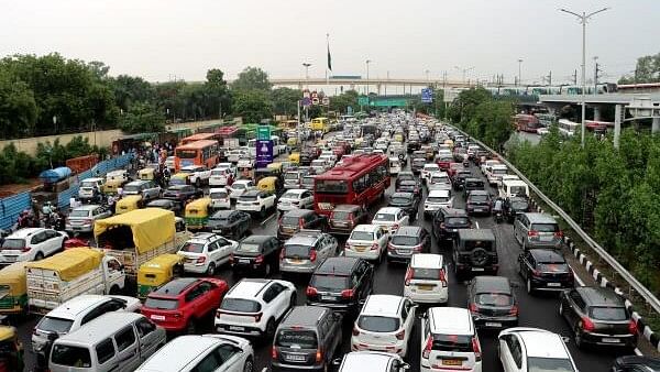 <div class="paragraphs"><p>Vehicles stuck in a traffic jam after heavy rainfall, in New Delhi, Friday, July 26, 2024.</p></div>