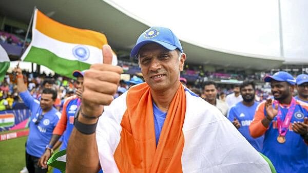 <div class="paragraphs"><p>Rahul Dravid poses for photos during celebration after India defeated South Africa in the ICC Men's T20 World Cup final cricket match at Kensington Oval, in Bridgetown, Barbados on June 30, 2024. </p></div>