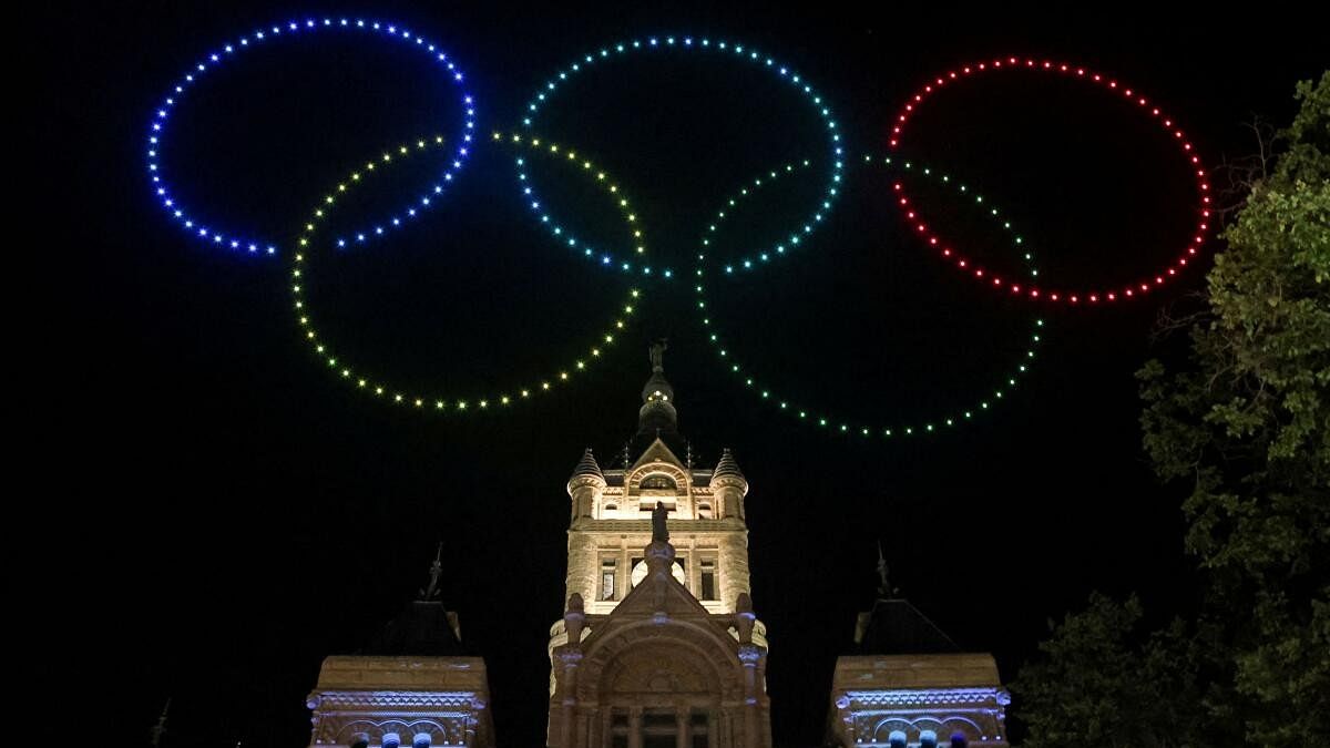 <div class="paragraphs"><p>Drones form the olympic rings, over the Salt Lake City and County Building, during a show, as people celebrate the announcement that Salt Lake City is officially awarded the rights to host the 2034 Winter Olympic and Paralympic Games, in Salt Lake City, Utah, US, July 24, 2024.</p></div>