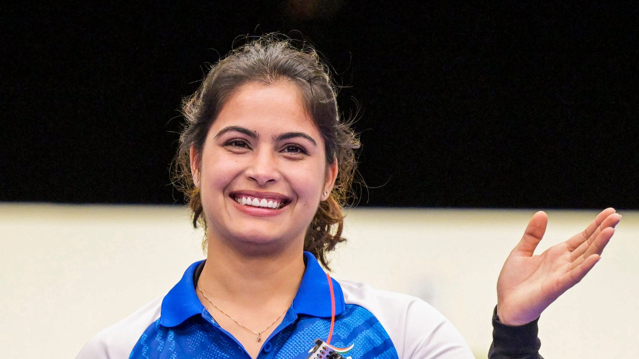 <div class="paragraphs"><p> India's Manu Bhaker poses for photos after finishing third in the presentation ceremony for the 10m Air Pistol Women's Final event at the Summer Olympics 2024.</p></div>