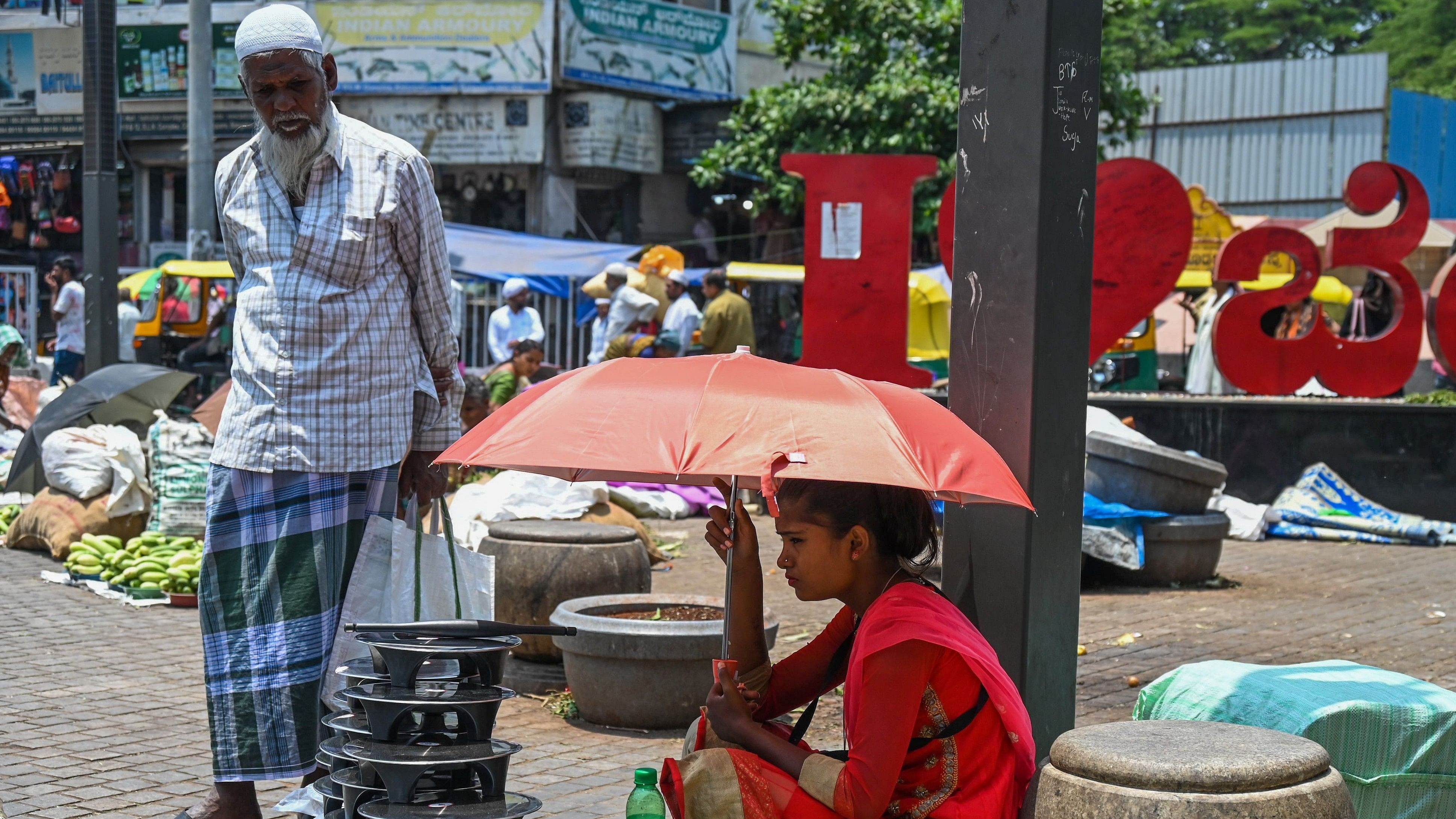 <div class="paragraphs"><p>A vegetable vendor at the Kalasipalyam market.&nbsp;</p></div>