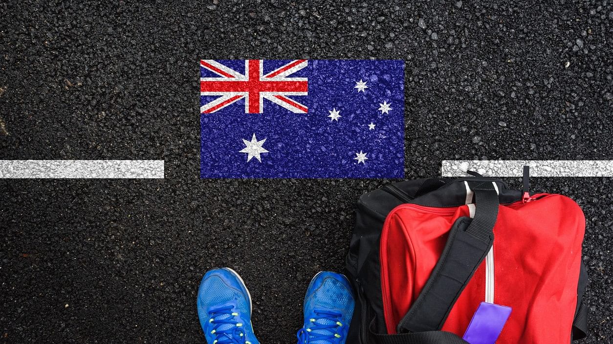 <div class="paragraphs"><p>Representative image showing a person standing over an Australia flag.</p></div>