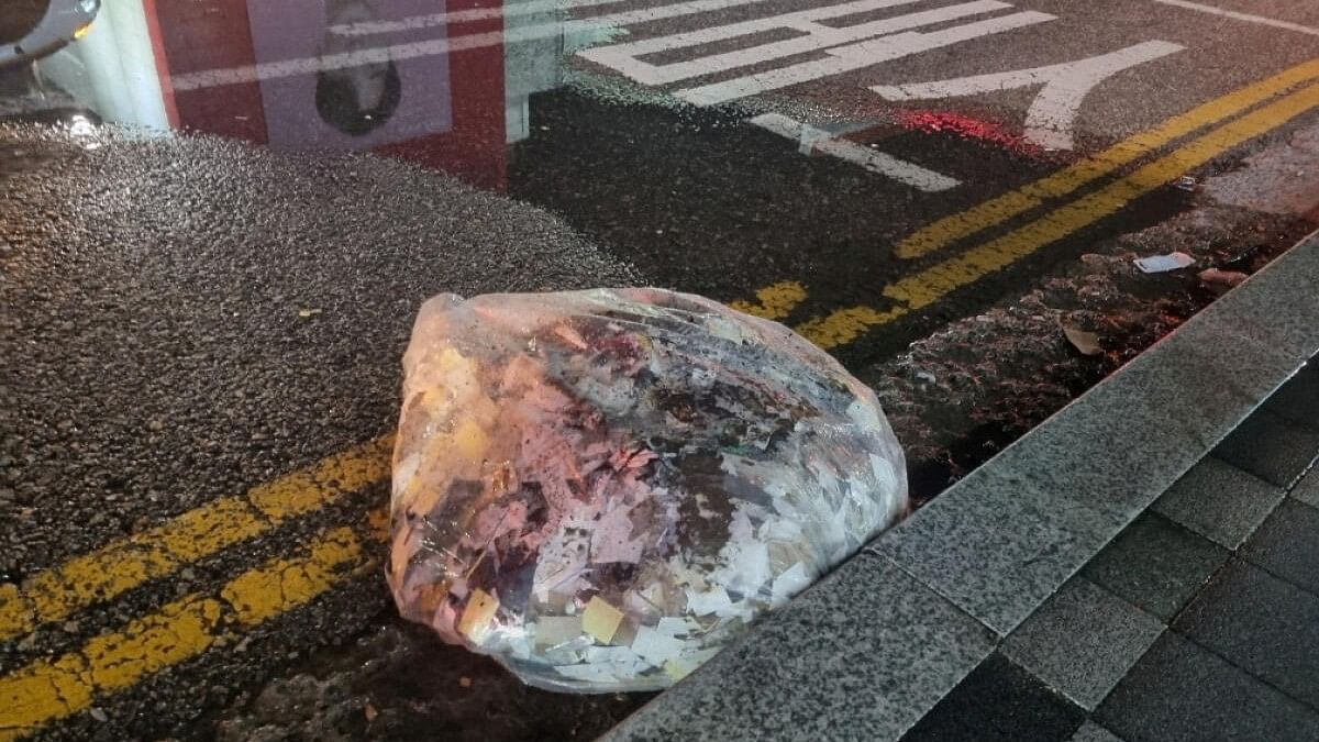 <div class="paragraphs"><p>A plastic bag carrying various objects including what appeared to be trash that crossed inter-Korean border with a balloon believed to have been sent by North Korea, is pictured in Seoul.</p></div>