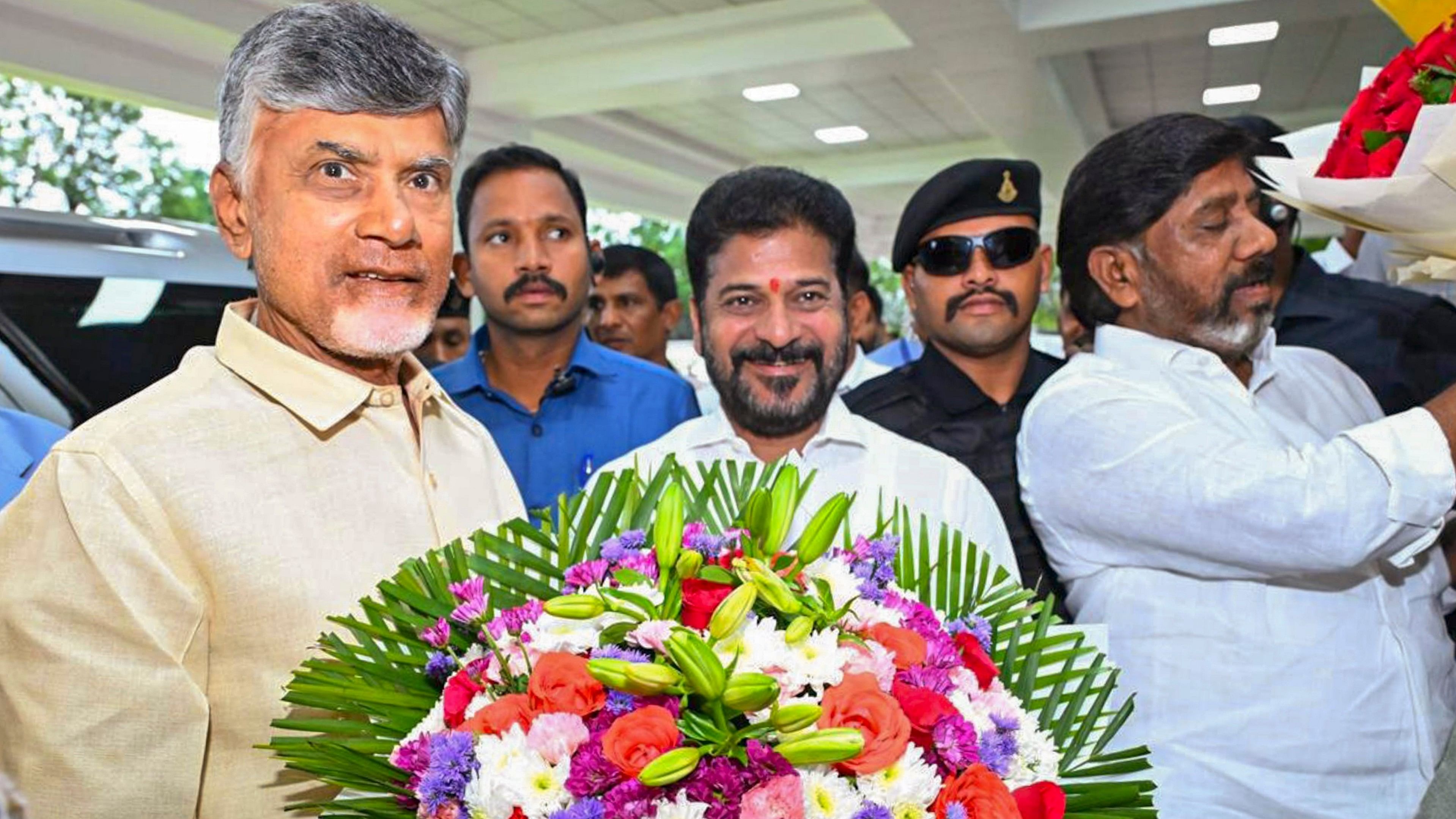 <div class="paragraphs"><p>Telangana Chief Minister Revanth Reddy welcomes Andhra Pradesh Chief Minister N Chandrababu Naidu upon his arrival at Praja Bhavan, in Hyderabad. Telangana Deputy Chief Minister Bhatti Vikramarka Mallu is also seen.</p></div>