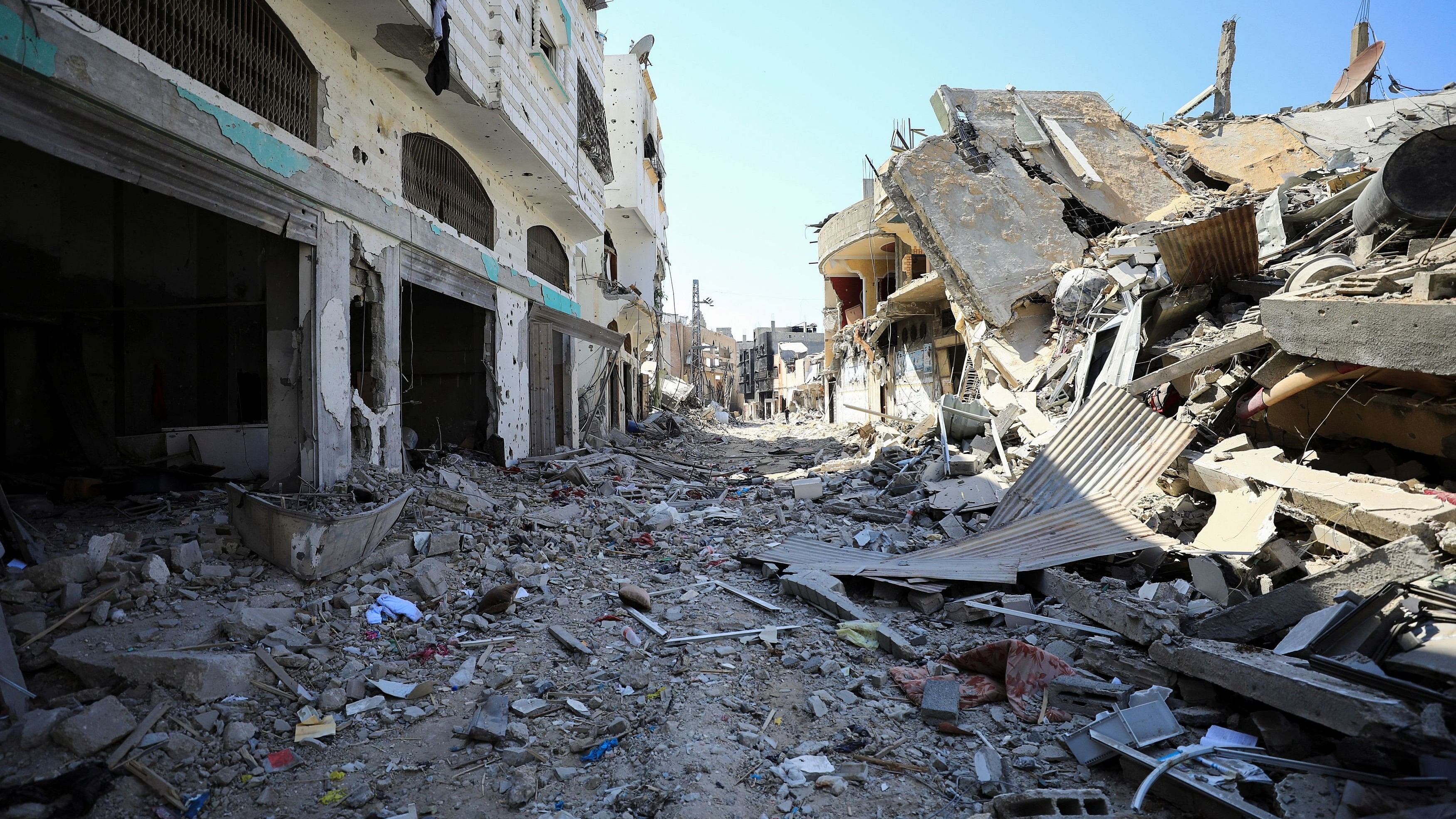 <div class="paragraphs"><p>Buildings lie in ruin, after Israeli forces withdrew from Shejaiya neighborhood, following a ground operation, amid Israel-Hamas conflict, in eastern part of Gaza city, July 10, 2024. </p></div>