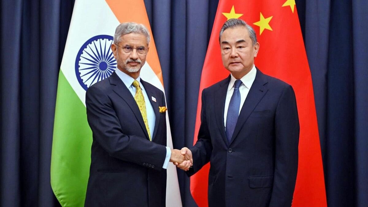 <div class="paragraphs"><p>External Affairs Minister S Jaishankar meets his Chinese counterpart Wang Yi during a meeting, in Astana.</p></div>