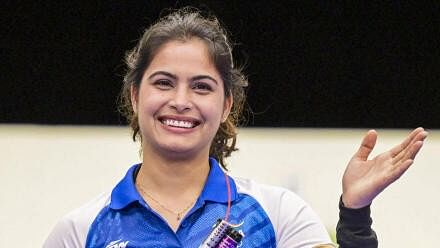 <div class="paragraphs"><p>India's Manu Bhaker poses for photos after finishing third in the presentation ceremony for the 10m Air Pistol Women's Final event at the Summer Olympics 2024, in Chateauroux, France, Sunday, July 28, 2024. </p></div>