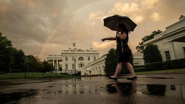 <div class="paragraphs"><p>A rainbow fills the sky behind the White House right after US President Joe Biden and first lady Jill Biden greeted NATO allies and partners ahead of a dinner at the White House in Washington, US on July 10, 2024.</p></div>