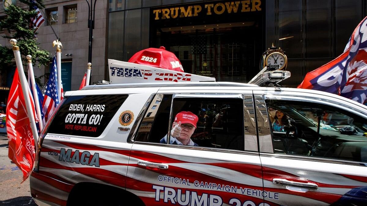 <div class="paragraphs"><p>A vehicle with slogans and images in support of Republican presidential candidate Donald and against US President Joe Biden and Vice President Kamala Harris.</p></div>