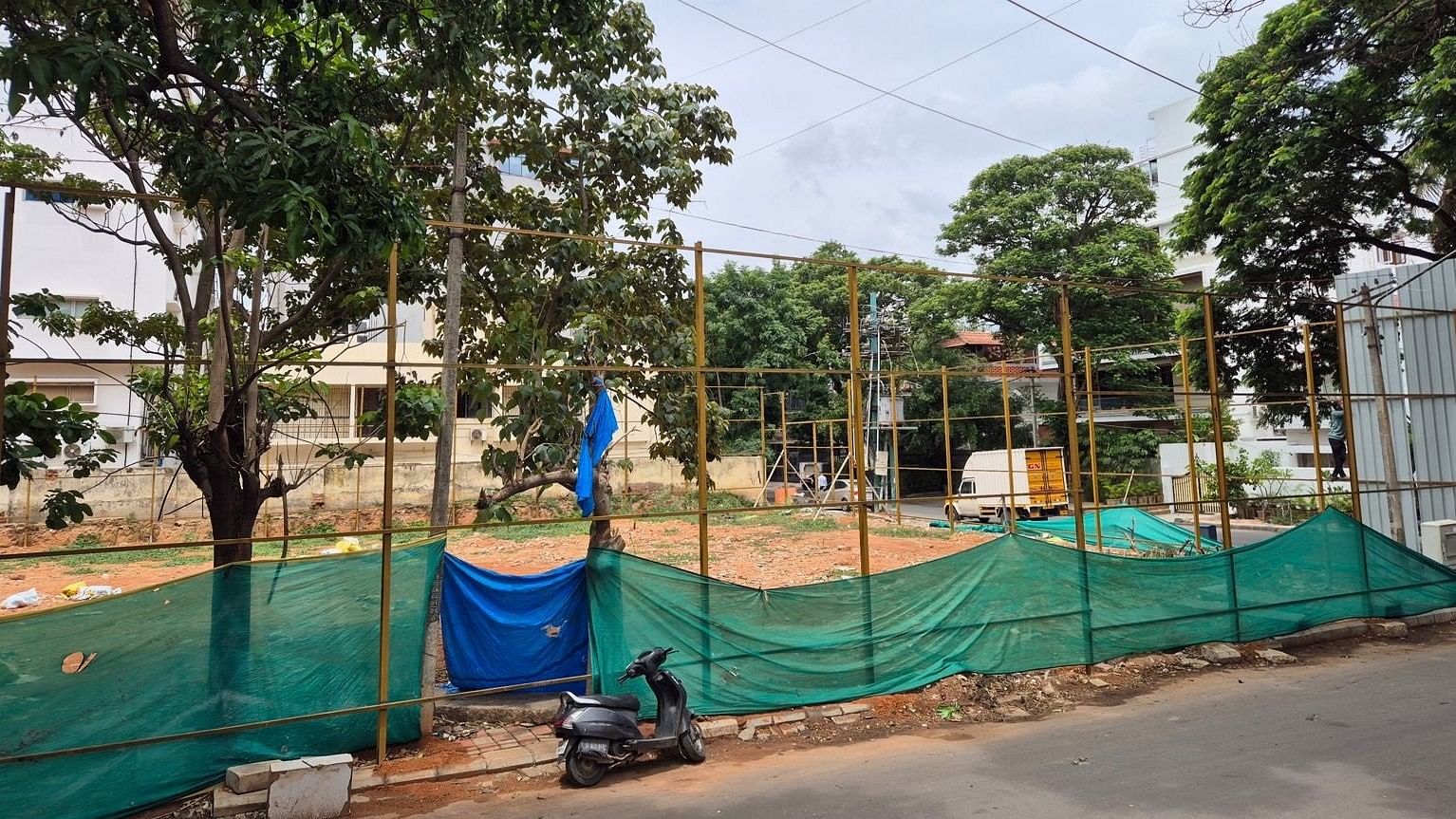 <div class="paragraphs"><p>A private builder has partly covered the site for a three-storey building after razing the BDA’s mini market. </p></div>