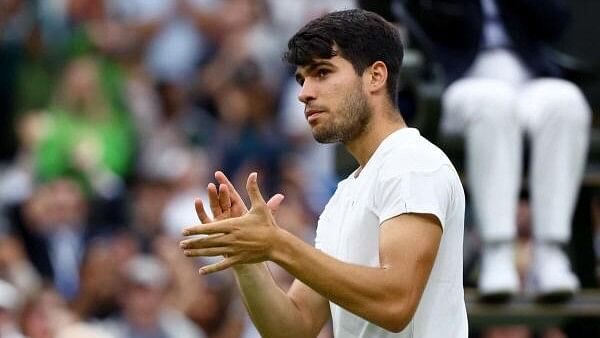 <div class="paragraphs"><p>Wimbledon - All England Lawn Tennis and Croquet Club, London, Britain - Spain's Carlos Alcaraz applauds fans after winning his quarter final match against Tommy Paul of the US.</p></div>