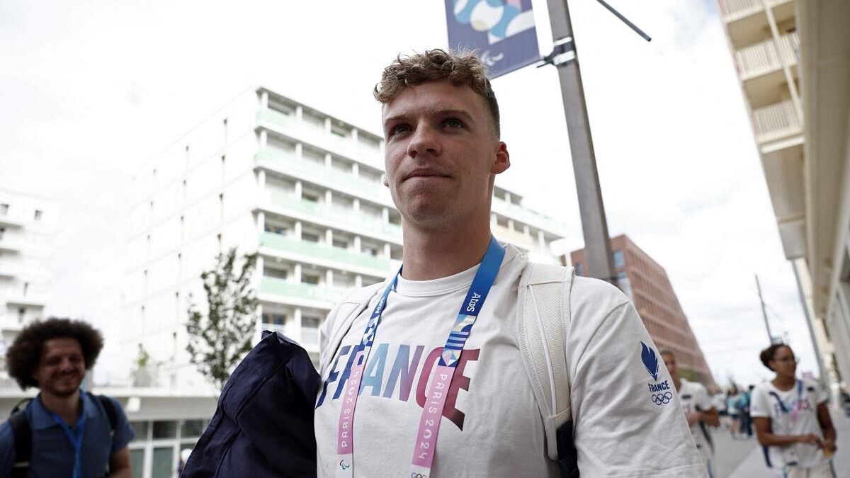 <div class="paragraphs"><p>Leon Marchand of France is seen in the Olympic village, ahead of the Paris 2024 Olympics.</p></div>