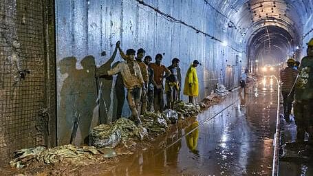 <div class="paragraphs"><p>Workers inside a waterlogged tunnel, in Pernem&nbsp;tunnel in the Madure-Pernem section in Goa.</p></div>