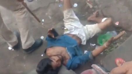 <div class="paragraphs"><p>A screengrab of the specially abled man who was assaulted by the Kanwariyas in UP.</p></div>