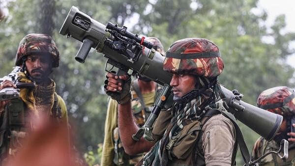 <div class="paragraphs"><p>Security personnel during an encounter with terrorists in a forest village in Doda district.</p></div>