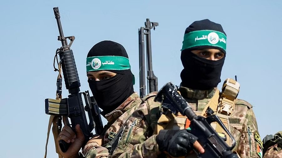 <div class="paragraphs"><p>Palestinian fighters from the armed wing of Hamas take</p></div>