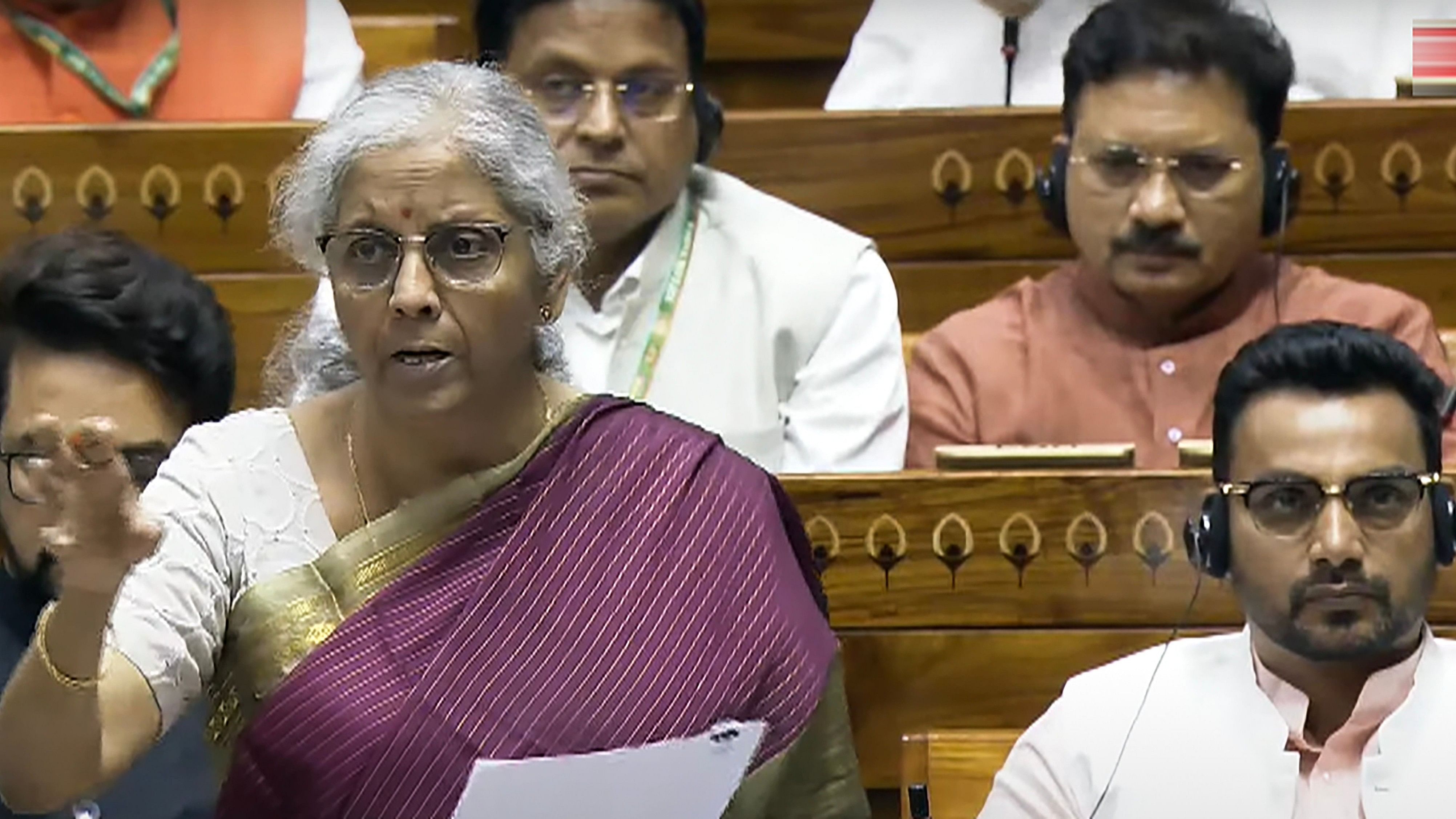 <div class="paragraphs"><p> Union Finance Minister Nirmala Sitharaman speaks in the Lok Sabha during the Monsoon session of Parliament, in New Delhi, Tuesday, July 30, 2024. </p></div>