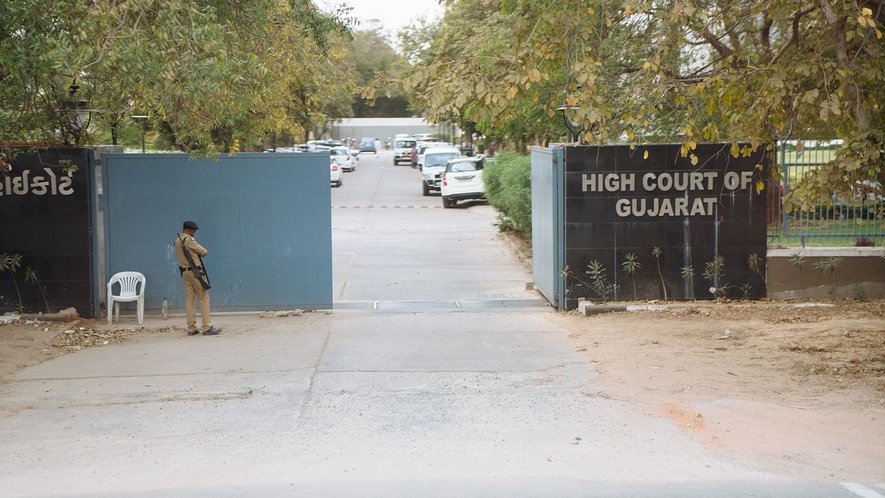 <div class="paragraphs"><p>Entrance of Gujarat HC.</p></div>