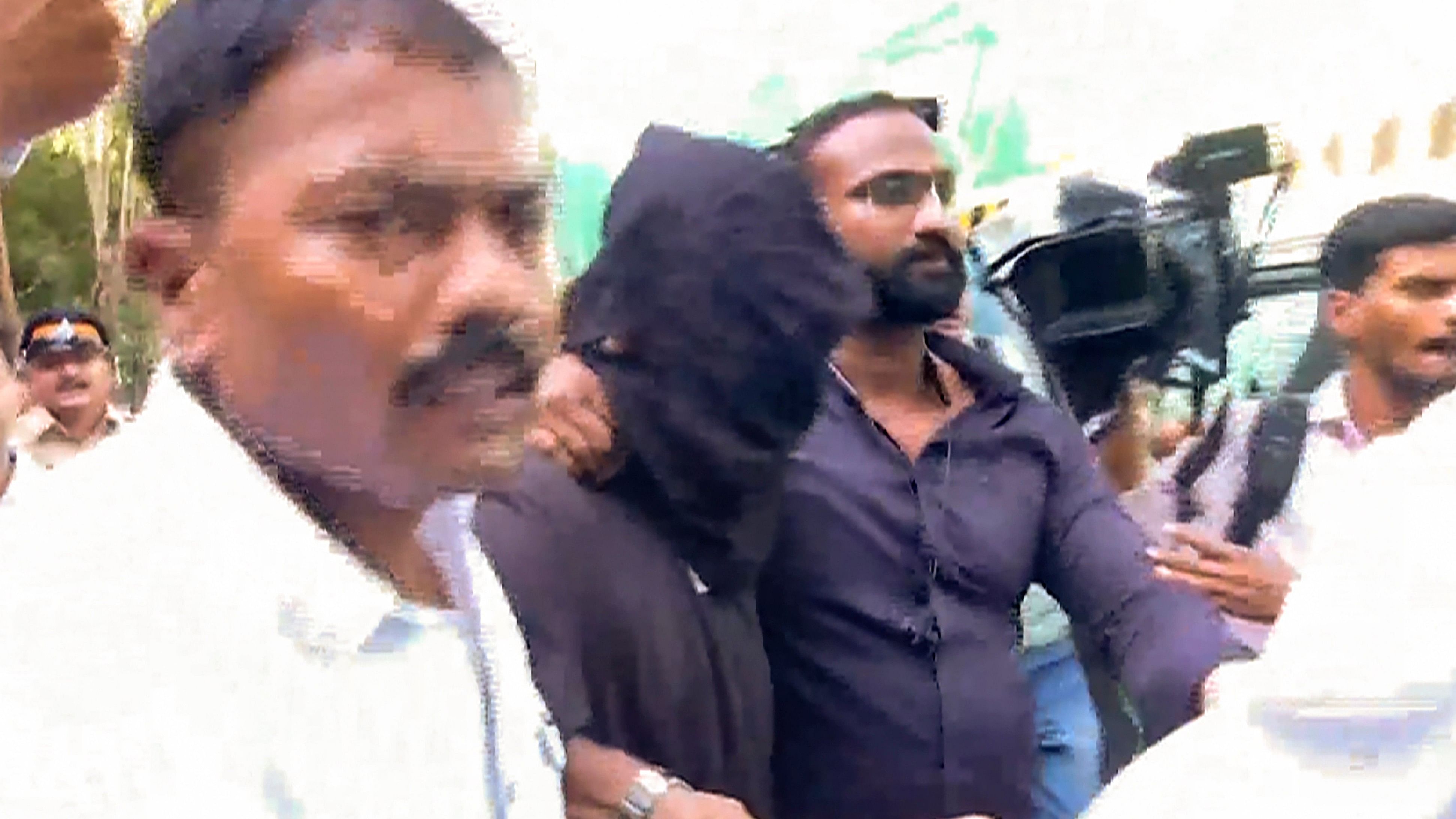 <div class="paragraphs"><p>Mihir Shah (face covered), the main accused in the Worli hit-and-run case, being taken by the Police.</p></div>