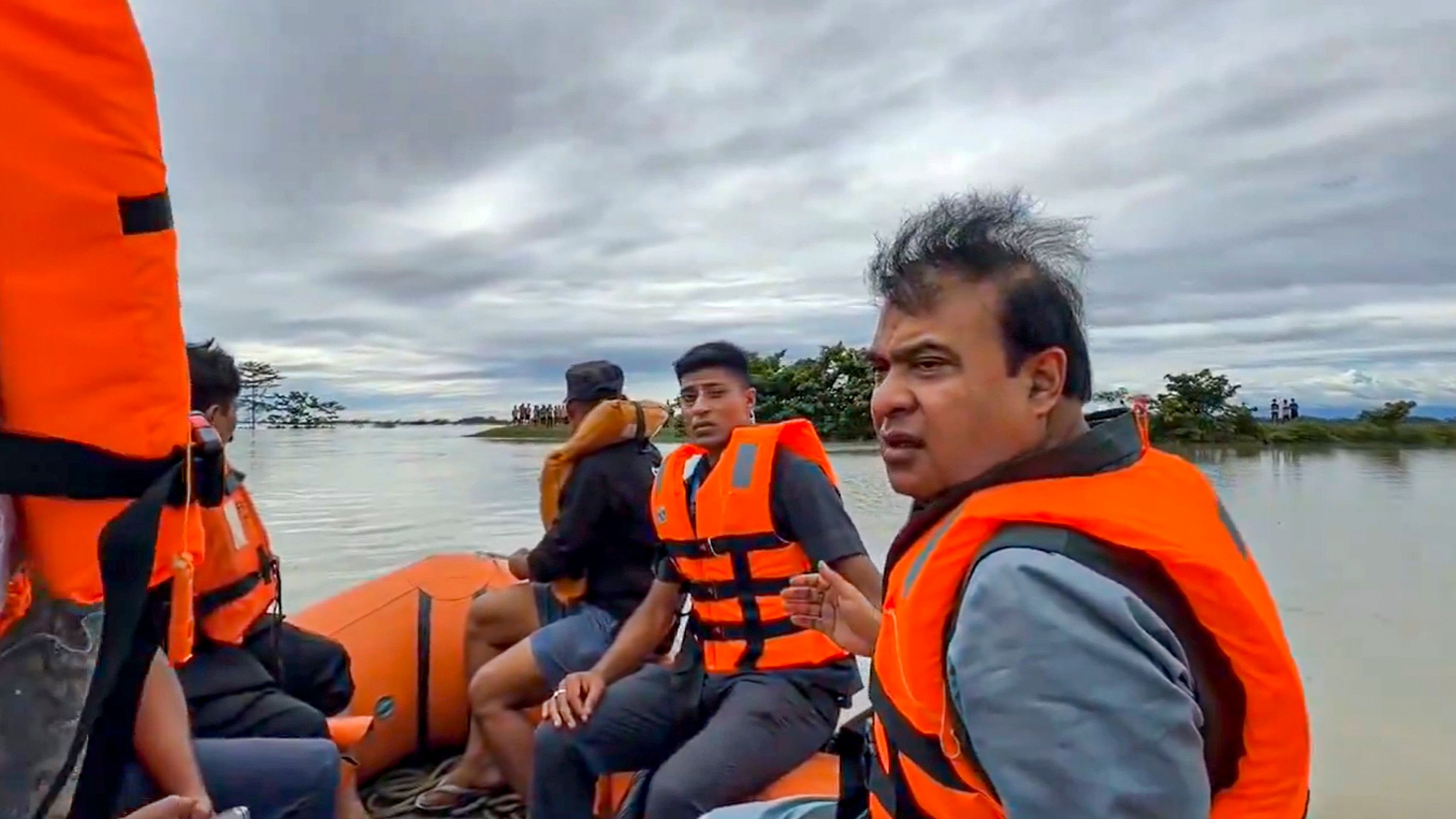 <div class="paragraphs"><p> Assam Chief Minister Himanta Biswa Sarma inspects the flood affected areas of Bokakhat, in Golaghat district, Assam, Tuesday, July 2, 2024. </p></div>