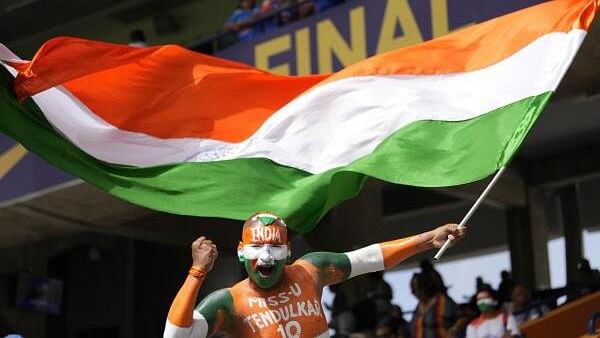 <div class="paragraphs"><p>An Indian fan cheers for his team before the start of the ICC Men's T20 World Cup final cricket match between India and South Africa at Kensington Oval in Bridgetown, Barbados</p></div>