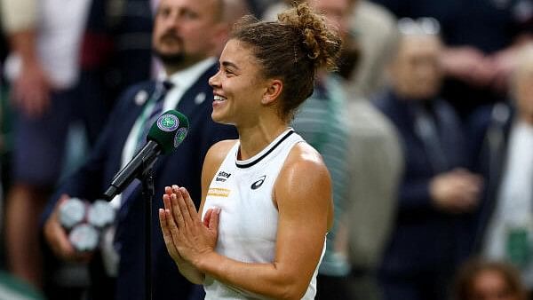 <div class="paragraphs"><p>Wimbledon - All England Lawn Tennis and Croquet Club, London, Britain - Italy's Jasmine Paolini celebrates winning her quarter final match against Emma Navarro of the US.</p></div>