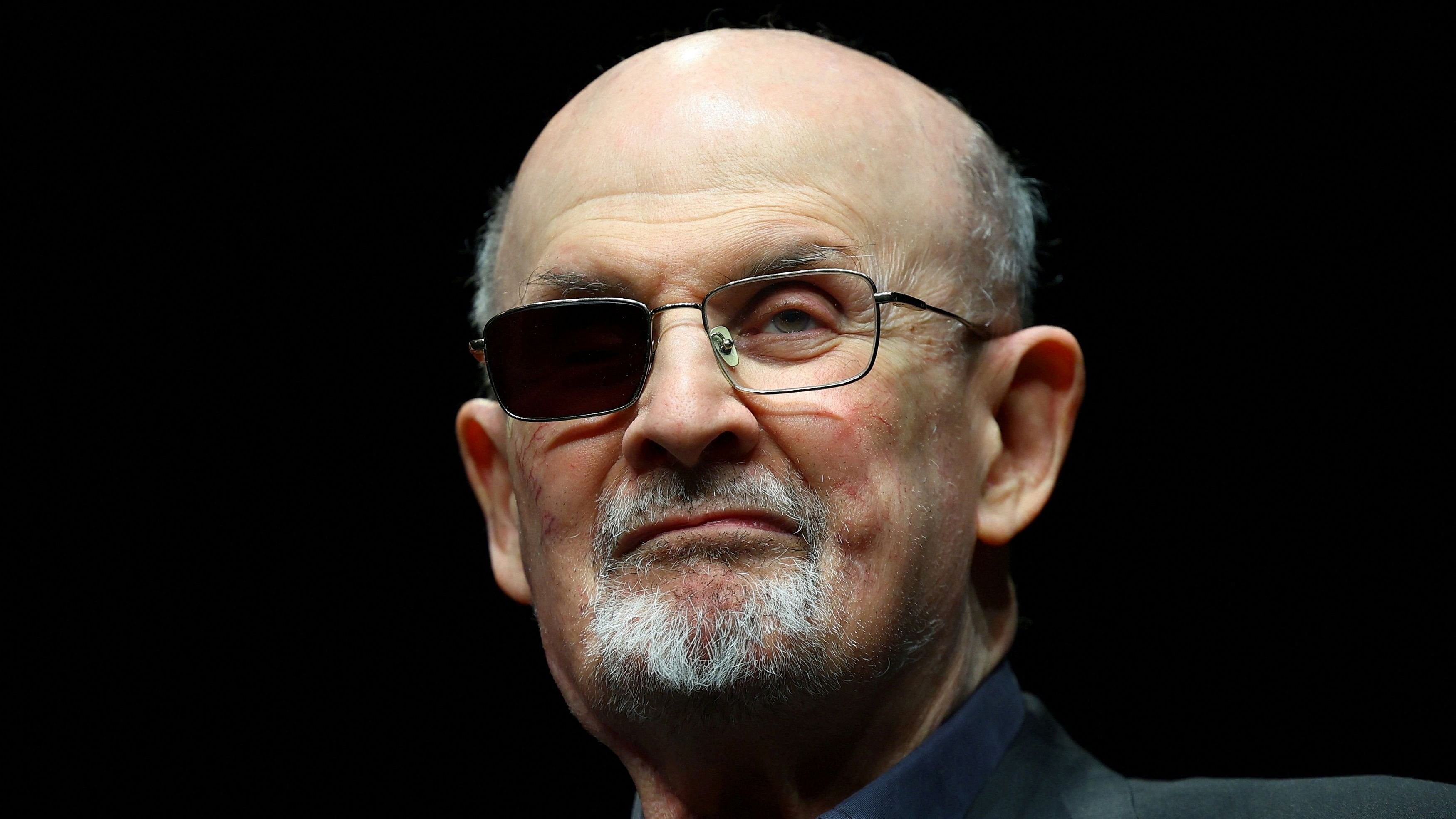 Author Salman Rushdie poses during a photocall ahead of the presentation of his book "Knife: Meditations After an Attempted Murder" at the Deutsches Theater in Berlin, Germany, May 16, 2024. REUTERS/Fabrizio Bensch