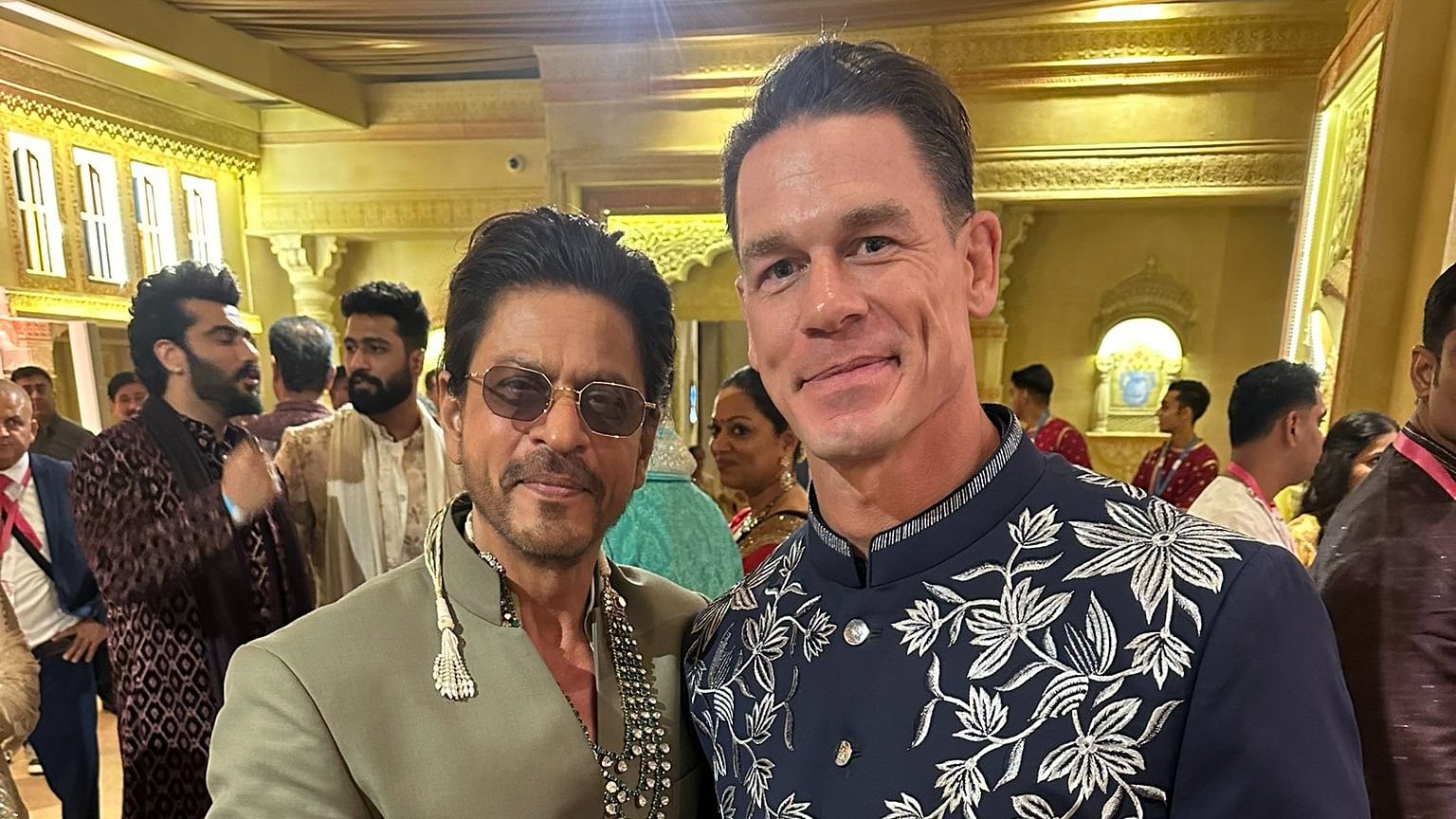 <div class="paragraphs"><p>(L to R) Bollywood actor Shah Rukh Khan with former American WWE star John Cena.</p></div>