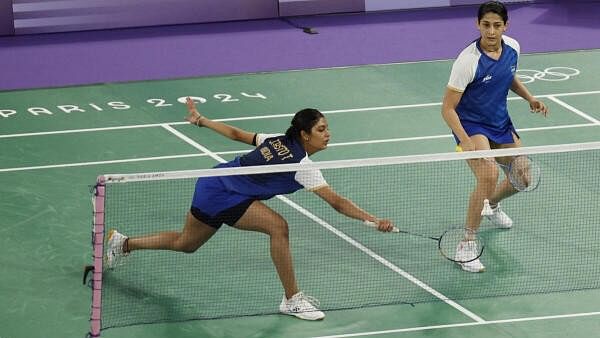 <div class="paragraphs"><p>Ashwini Ponnappa  and Tanisha Crasto of India in action during the Group C match against Nami Matsuyama of Japan and Chiharu Shida of Japan.</p></div>