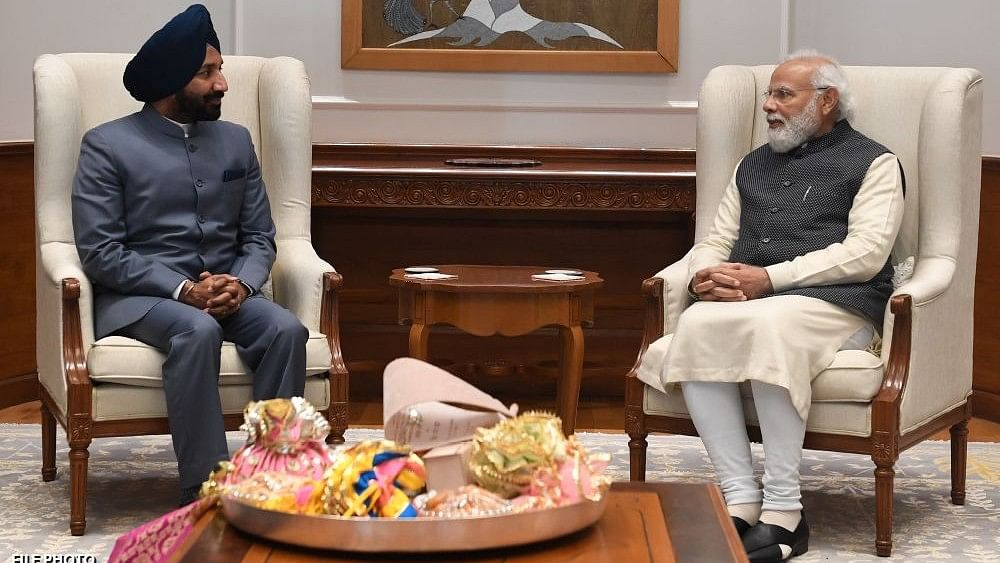 <div class="paragraphs"><p>Nominated MP Satnam Singh Sandhu with Prime Minister Narendra Modi.</p></div>