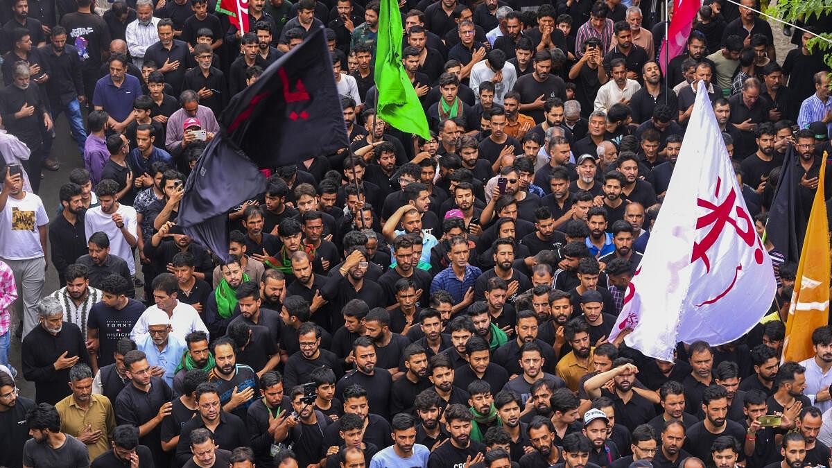 <div class="paragraphs"><p>Shia Muslim devotees during the Muharram procession in Srinagar.</p></div>