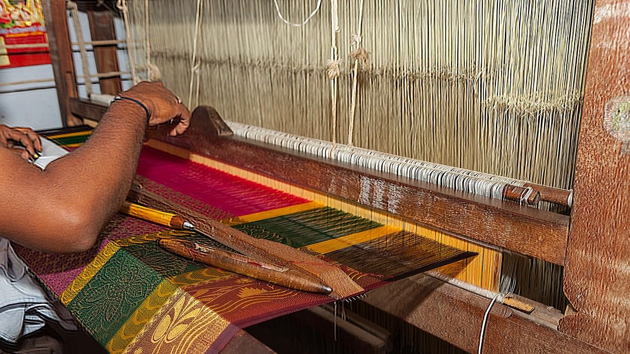 <div class="paragraphs"><p>Representative image of a person weaving.</p></div>