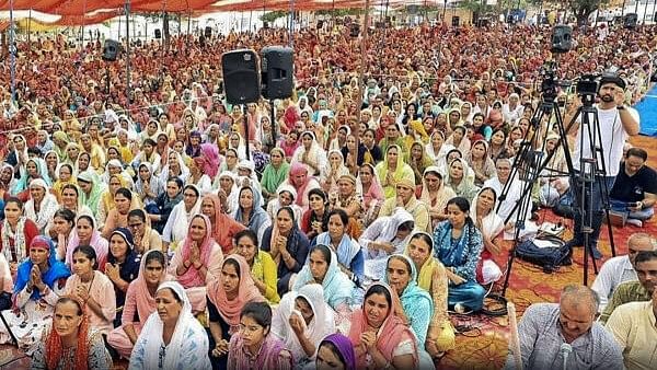 <div class="paragraphs"><p>Hathras: Devotees at the religious gathering where a stampede broke out, in Hathras district, Tuesday, July 2, 2024.</p></div>