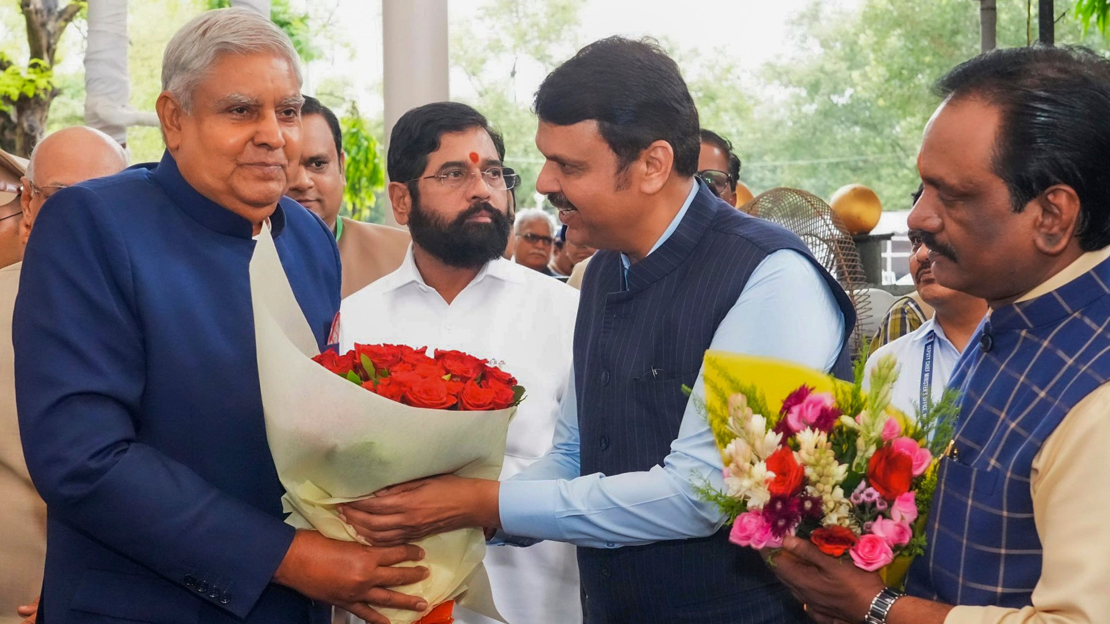 <div class="paragraphs"><p>Vice President Jagdeep Dhankhar being welcomed by Maharashtra Deputy Chief Minister Devendra Fadnavis upon his arrival at Vidhan Bhavan, Mumbai. Maharashtra CM Eknath Shinde is also seen. </p></div>