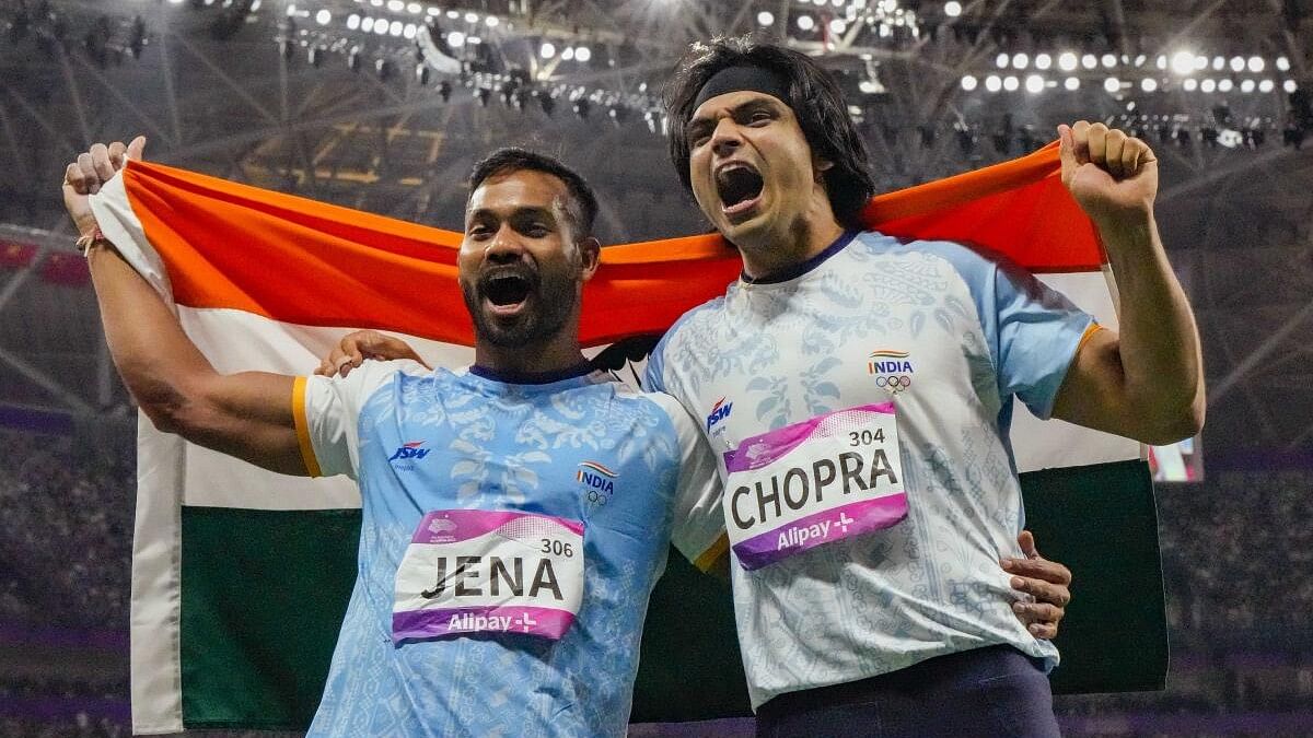 <div class="paragraphs"><p> Indian athletes Neeraj Chopra and Kishore Kumar Jena celebrate.</p></div>