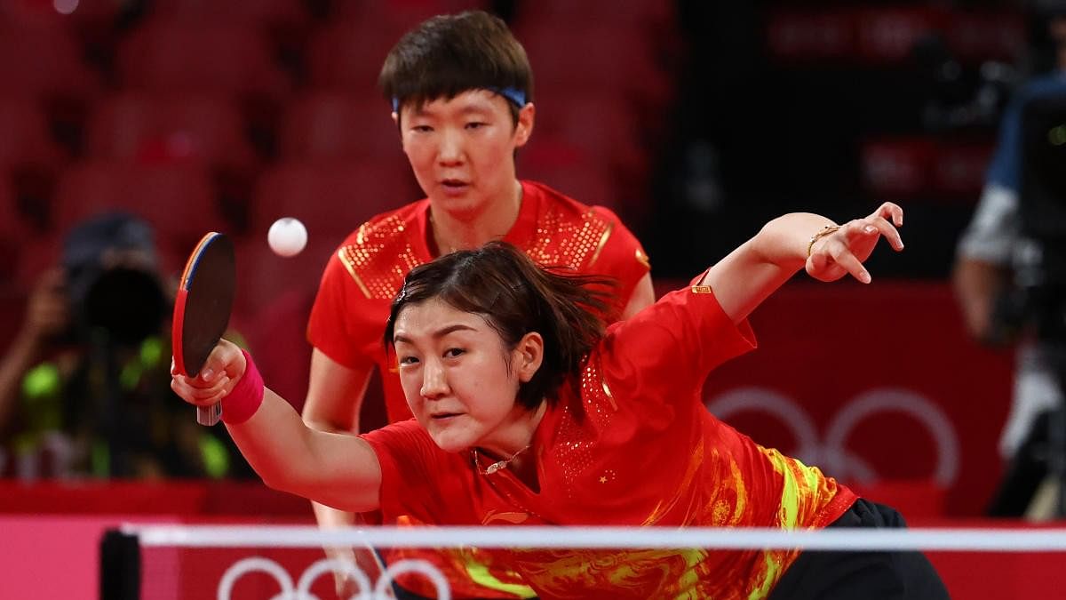 <div class="paragraphs"><p>File photo of&nbsp;Chen Meng of China and Wang Manyu of China in action against Kasumi Ishikawa of Japan and Miu Hirano of Japan during the finals of the Tokyo Olympics.</p></div>