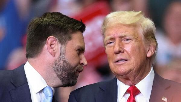 <div class="paragraphs"><p>Republican presidential nominee and former US President Donald Trump stands with Republican vice presidential nominee US Senator J.D. Vance (R-OH), as he holds a rally for the first time with his running mate, in Grand Rapids, Michigan, US July 20, 2024.</p></div>