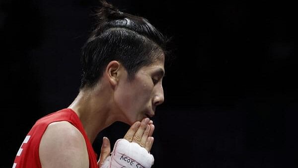 <div class="paragraphs"><p>Yu Ting Lin of Taiwan reacts after winning her fight against Svetlana Kamenova Staneva of Bulgaria.</p></div>