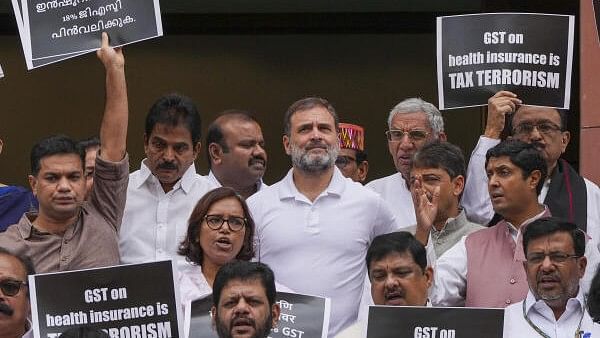 <div class="paragraphs"><p>LoP in Lok Sabha Rahul Gandhi and other opposition MPs participate in a protest demanding removal of 18 percent GST from health/medical insurance, during ongoing Monsoon session of Parliament in New Delhi, Tuesday, Aug. 6, 2024.</p></div>