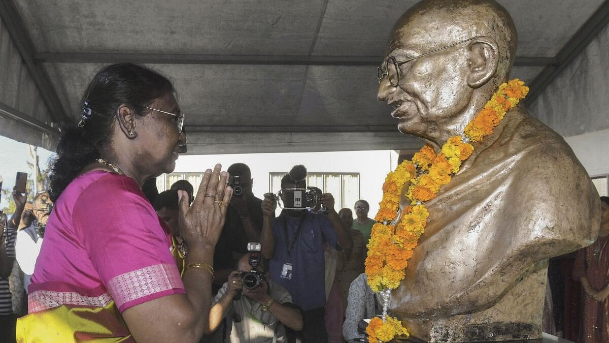 <div class="paragraphs"><p>President Droupadi Murmu pays tribute to Mahatma Gandhi at his memorial, in Suva. </p></div>