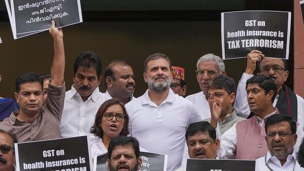 <div class="paragraphs"><p>LoP in Lok Sabha Rahul Gandhi and other opposition MPs participate in a protest demanding removal of 18 per cent GST from health/medical insurance during ongoing Monsoon session of Parliament in New Delhi on Tuesday, August 6, 2024. </p></div>