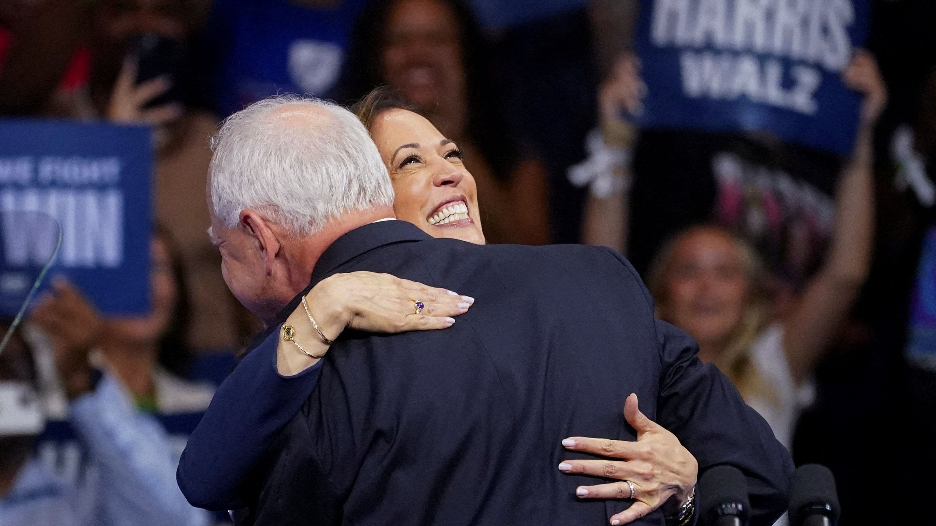 <div class="paragraphs"><p>US Vice President and Democratic presidential candidate Kamala Harris and her newly chosen vice presidential running mate Minnesota Governor Tim Walz embrace during a campaign rally in Philadelphia, Pennsylvania, US, August 6, 2024.</p></div>